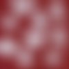 A. serviette papier motifs de noël sur fonds rouge 