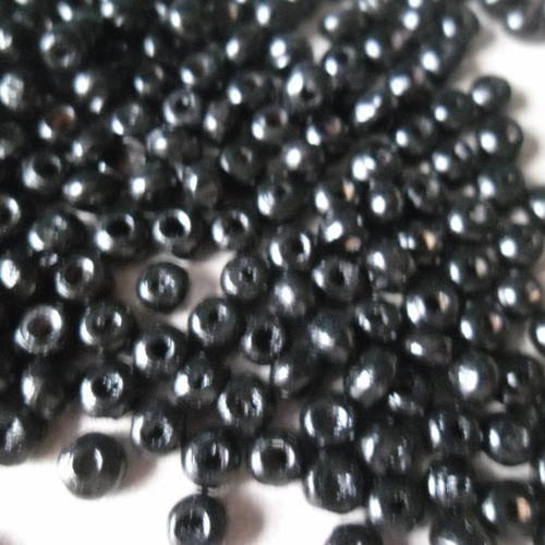 X 100 perles intercalaires en bois rond couleur noir 4 mm 