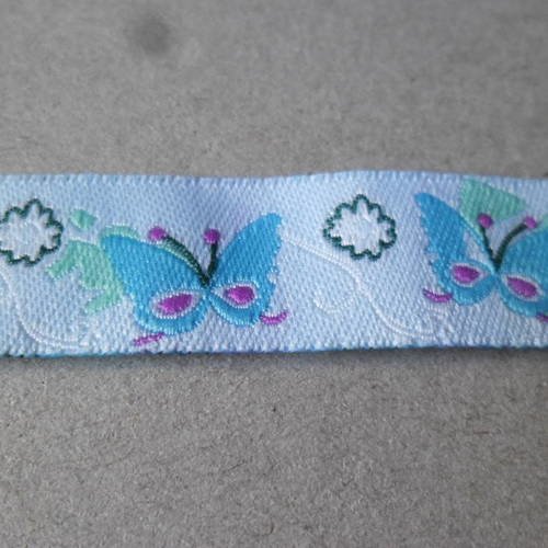X 1 mètre de ruban tissé imprimé motif papillon ton bleu polyester 17 mm 