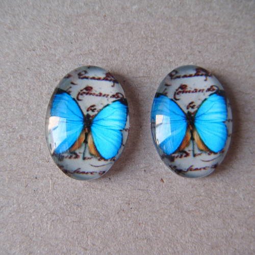 X 2 cabochons camées en verre motif papillon ton bleu 18 x 13 mm 