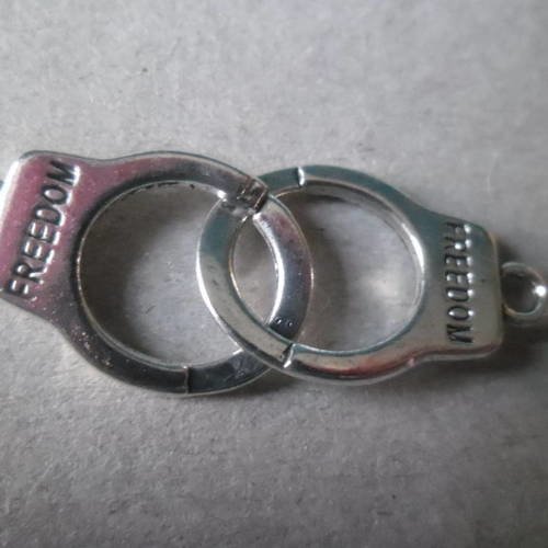 X 1 pendentif connecteur charms menotte"freedom" argenté 24 x 15 mm 