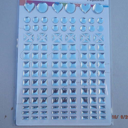 1 plaque de 128 stickers blanc de différentes formes et tailles 