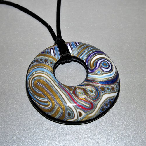 Collier anneau multi-motifs
