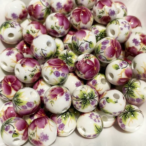 10 mm. perle en céramique décor fleur. rose