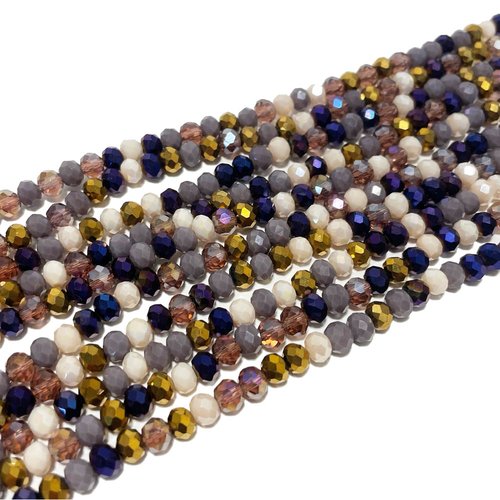 6 *5 mm. perles en verre à facettes. violet multicolore env 88 perles