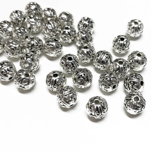 8 mm. 5 perles alliage argenté fantaisie.