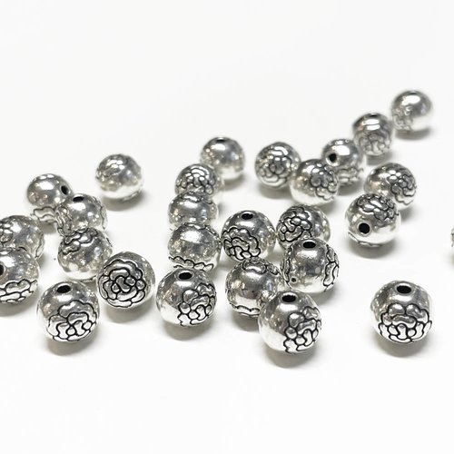 8 mm. 5 perles alliage argenté gravure fleur.