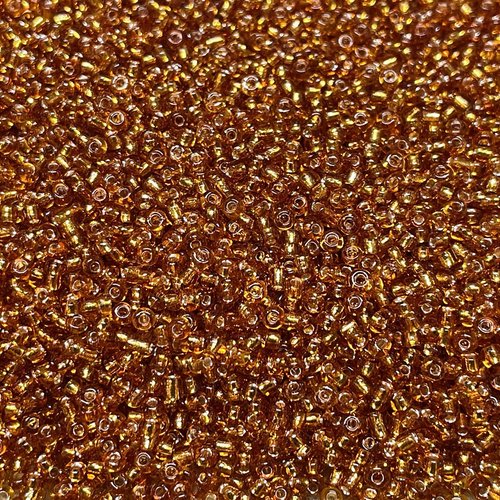 225 g. 2 mm, perles de rocaille, topaze doré.