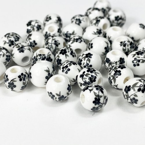 8mm. 5 perles boules céramique. peint fleur noire