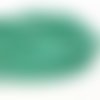 6*5 mm. perles en verre à facettes. turquoise. environ 88 perles