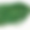 4*3 mm. perles verre à facettes vert éléctroplaqué. environ 92 perles.