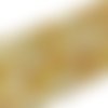 6 mm. perles agate teintée jaune à facettes. fil de 60-63 perles
