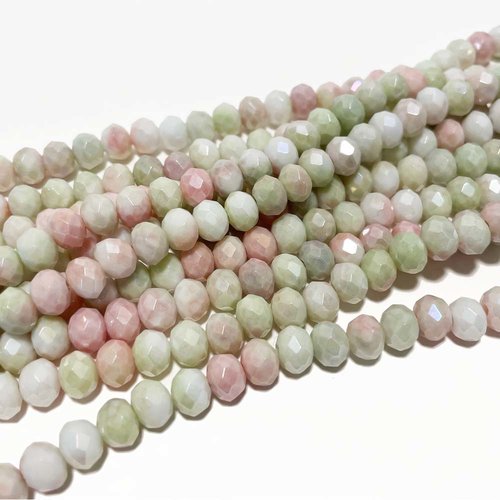 8 *6 mm. perles verre facettes vert rosé. env 66 p