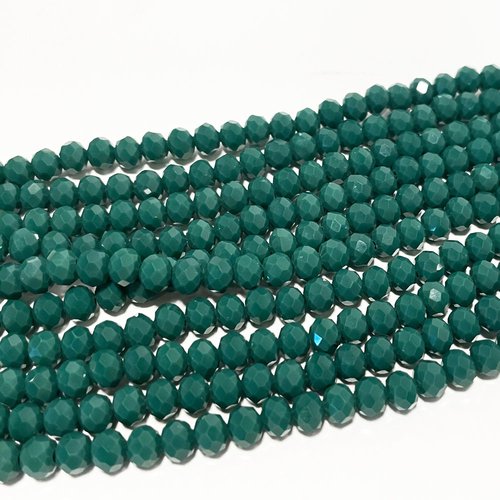 6*5 mm, perles verre à facettes. vert sapin. fil de 88 perles env.