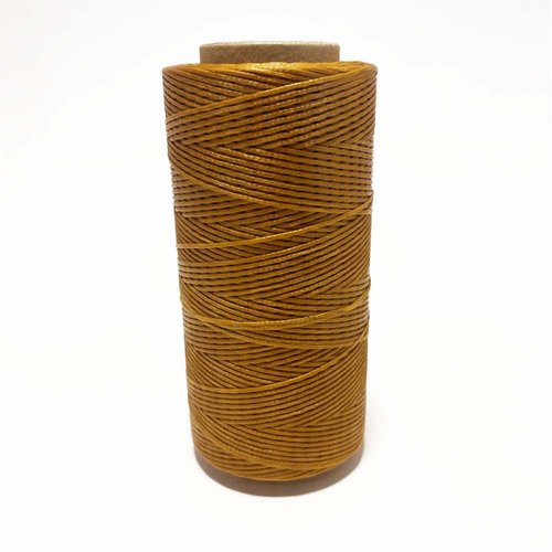 260 m. bobine cordon polyester enduit. or foncé. 1 mm.