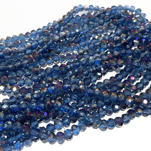 6 mm. perles verre rondes à facettes bleu irisé. 83 p.
