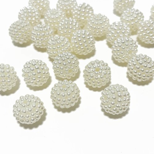 12 mm. 40 perles baies acrylique ivoire.