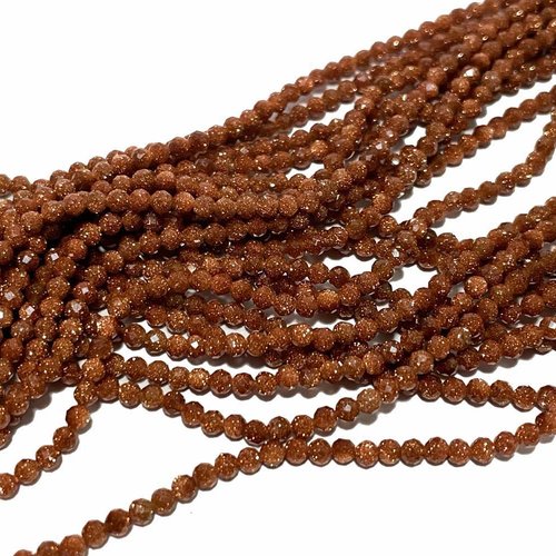 2 mm. perles en pierre de sable synthétique à facettes. fil 85 p