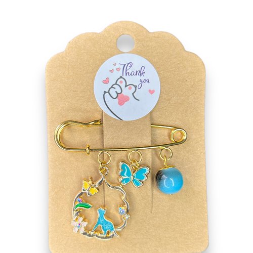 Broche dorée chat turquoise
