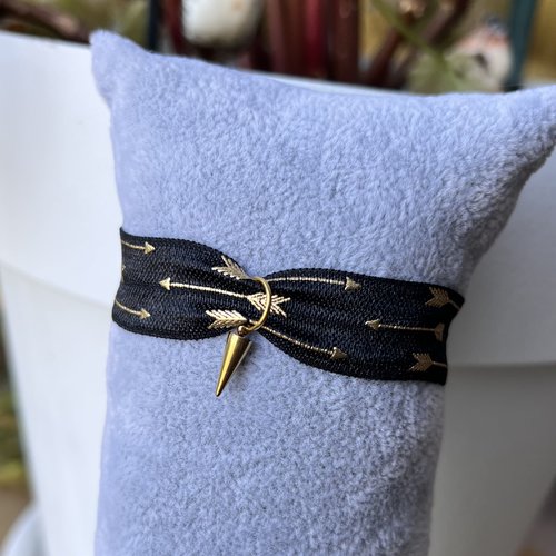 Bracelet élastique noir et flèches dorées