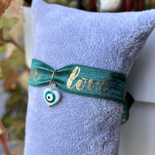 Bracelet élastique vert : love + breloque œil en nacre