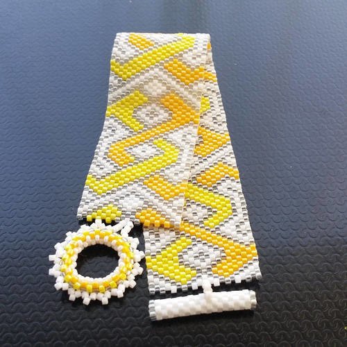 Bracelet manchette formes géométriques en perles délicas multicolores