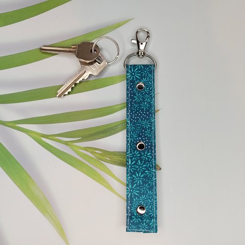 Porte clés floral turquoise
