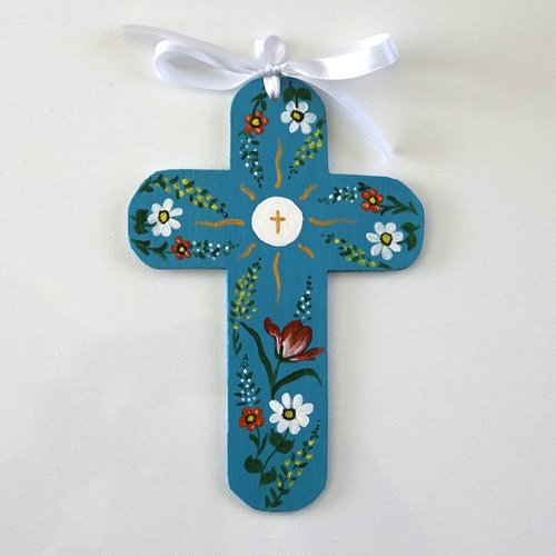 Croix de l'espérance de baptême ou de communion en bois fleurs orange et blanche sur fond turquoise