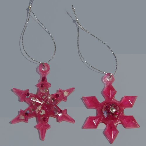 Noel - lot de 2 flocons moyens fuschia transparent