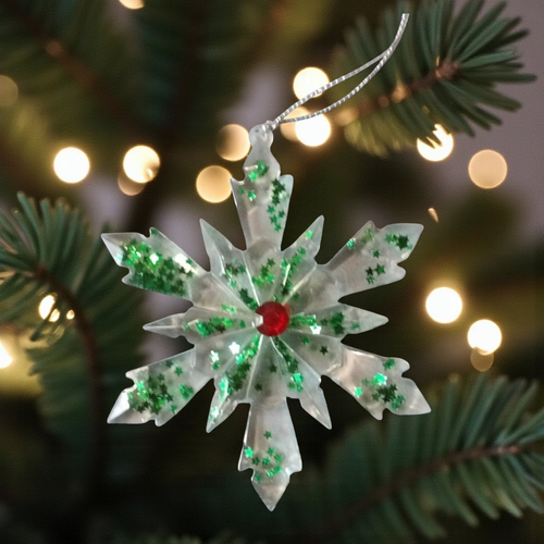 Noel - gros flocon translucide paillettes vertes et gros strass rouge