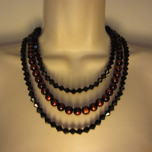 Collier noir et orange multi rangs en perles de verre