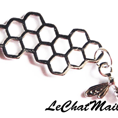 Breloque pendentif en métal argenté abeille avec son rayon de miel alvéoles bourdon géométrique 