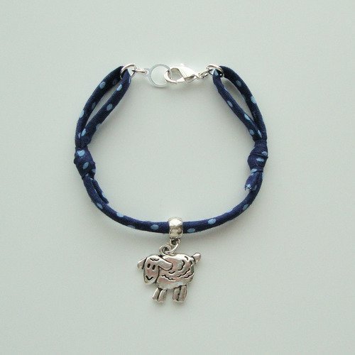 Bracelet ajustable en cordon "bleu intense à pois", mouton et fermoir en métal argenté.