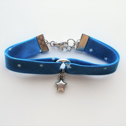 Bracelet biais en tissu première étoile "curaçao", breloque étoile et fermoir en métal argenté.