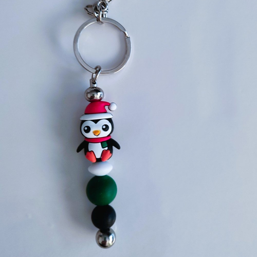 Porte clés métal argenté pingouin perles silicone