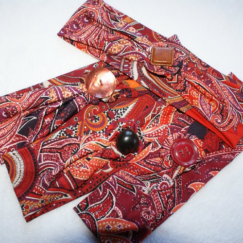 Bandeau jersey imprimé tons rouge bordeaux , orangé et marron