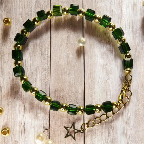 Bracelet en perles de verre vert et d’hématite