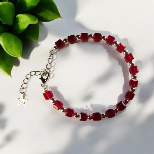 Bracelet en perles de verre rouge et d’hématite