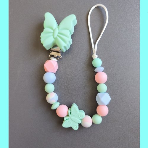 Attache tétine papillon amande