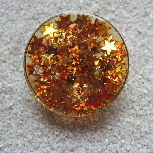 Grande bague ajustable unisexe étoiles oranges en résine diamètre 35mm