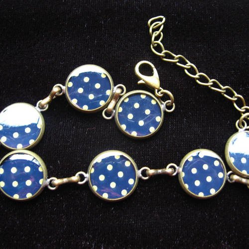 Bracelet petits cabochons, pois dorés sur fond noir, sertis en résine / diamètre 12mm