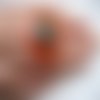 Très grande bague ajustable unisexe cabochon multicolore en fimo sur fond orange en résine diamètre 40mm