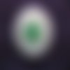 Bague ajustable unisexe étoile de mer verte sur fond de sable en résine diamètre 25mm