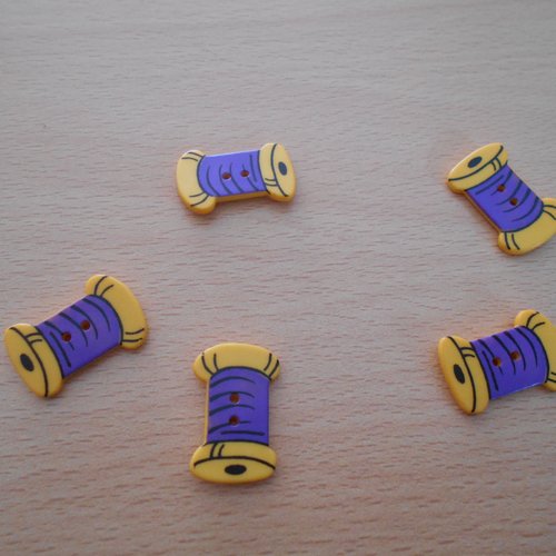 Bouton bobine de fil violet et jaune