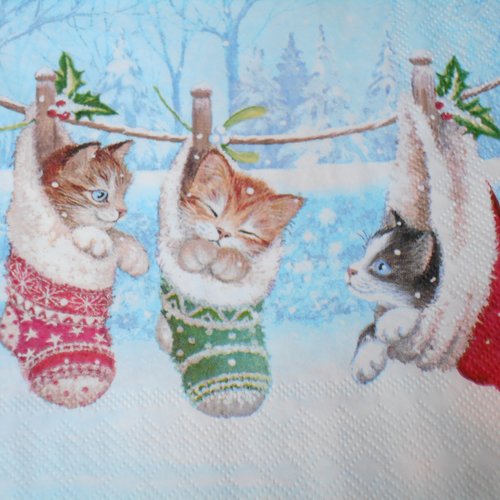 Serviette thème chatons dans des chaussettes de noël