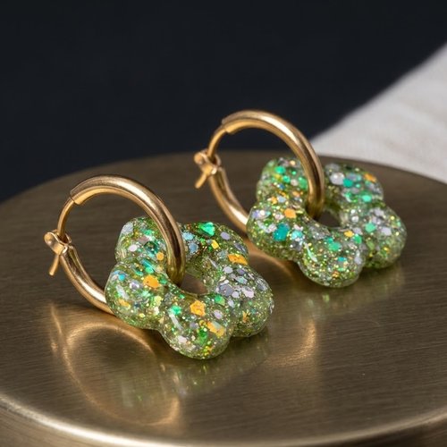 Charms interchangeables avec leur paire de créole