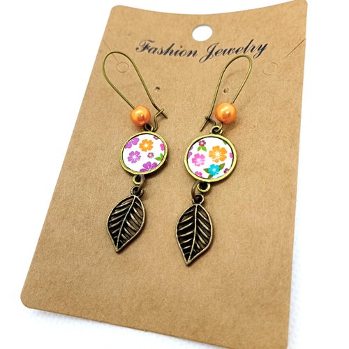 Boucles d’oreilles bronze *jolis motifs floraux* avec cabochons en résine