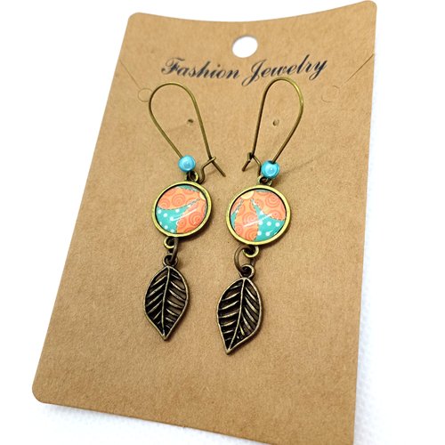 Boucles d’oreilles bronze *jolis motifs turquoises et oranges* avec cabochons en résine