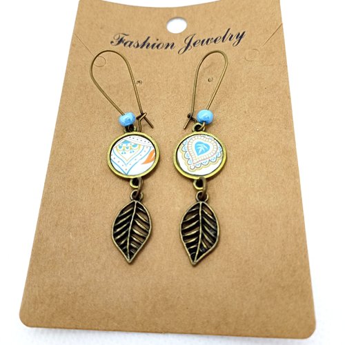 Boucles d’oreilles bronze *jolis motifs* avec cabochons en résine