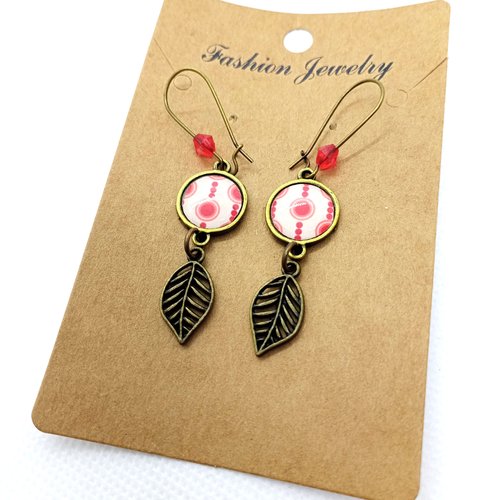 Boucles d’oreilles bronze *jolis motifs* avec cabochons en résine